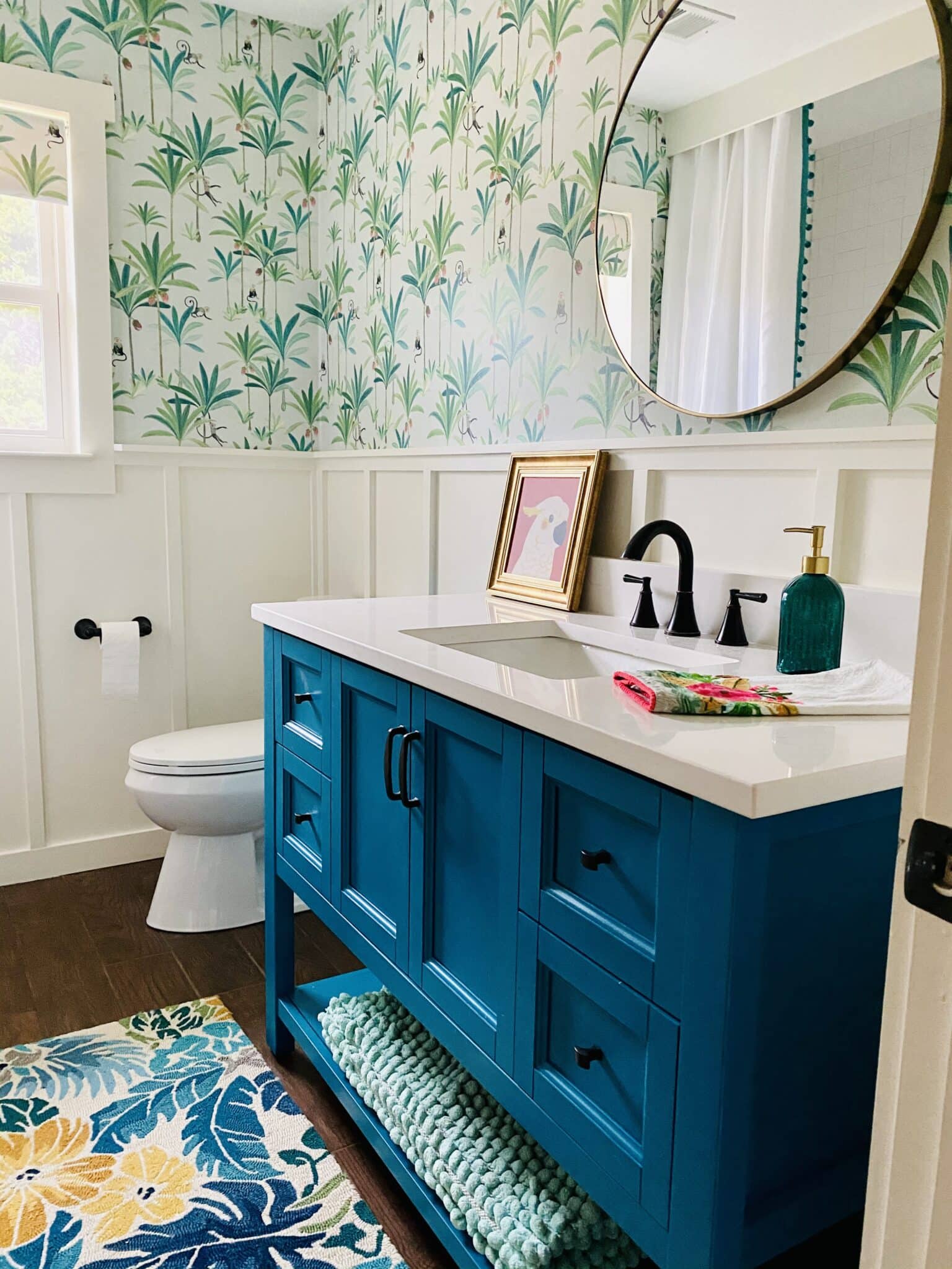 The painted vanity in our bathroom reveal