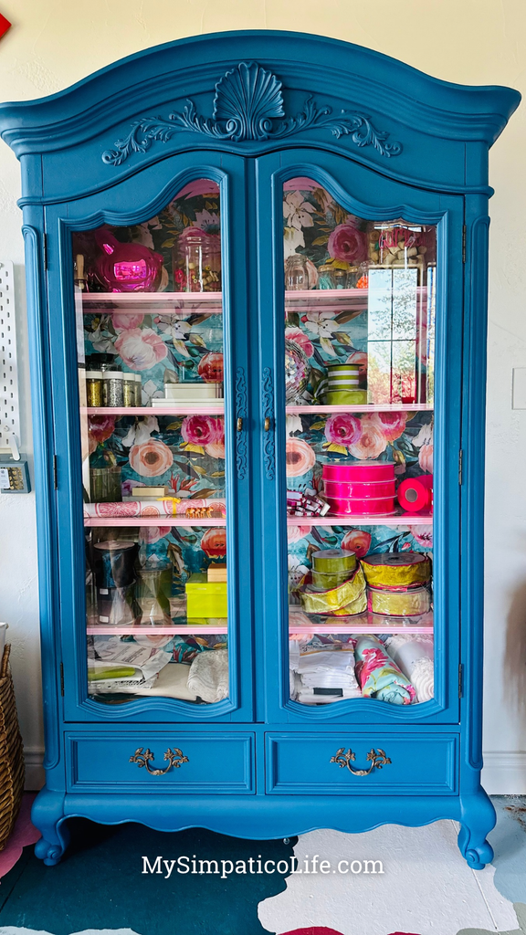 Blue Bookcase with bold wallpaper backdrop | MySimpaticoLife.com